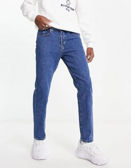 slim jeans in mid wash blue