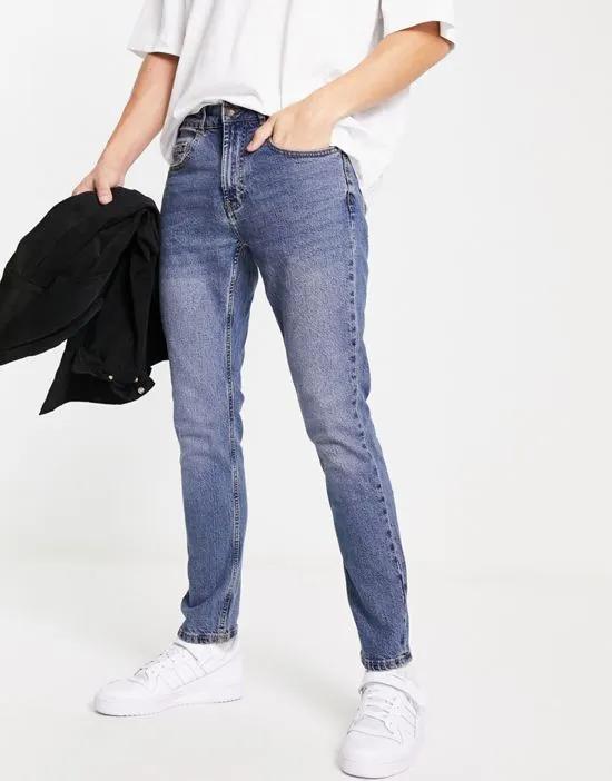 slim jeans in mid wash