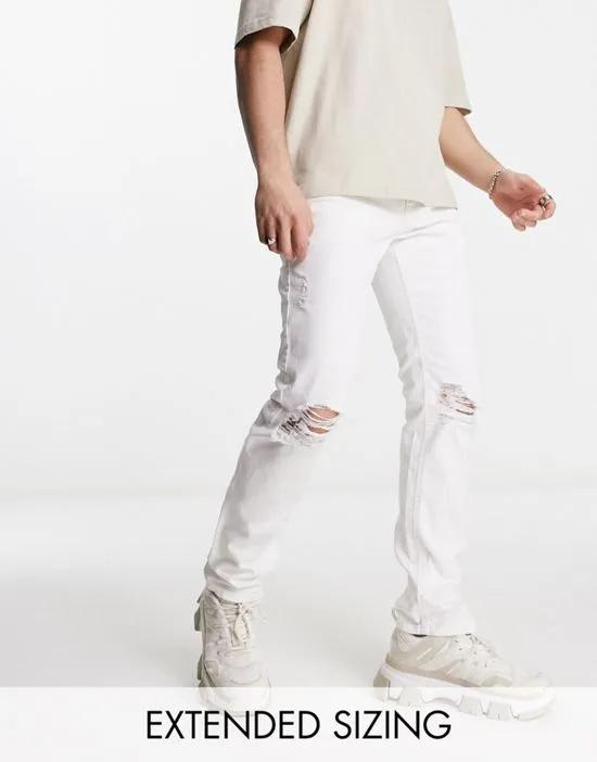slim jeans with knee rips in white