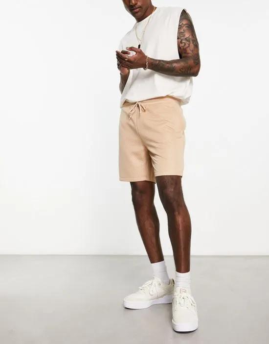 slim shorts in beige quilted texture