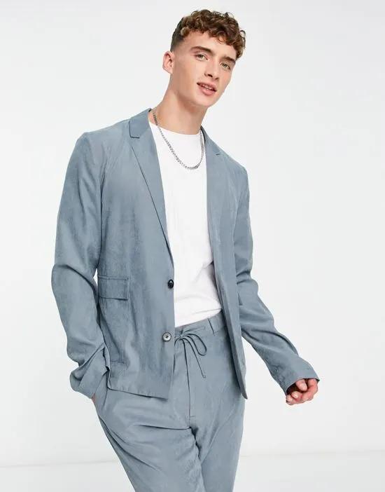 slim soft tailored suit jacket in muted blue suede