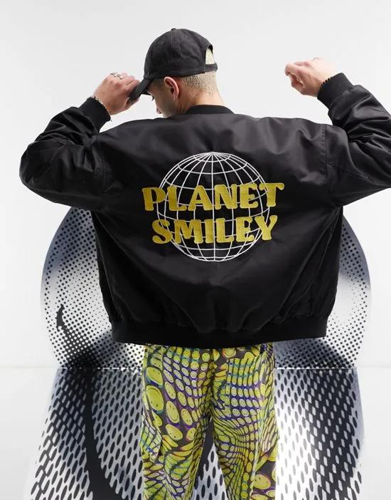 Smiley Collab black bomber jacket with planet print