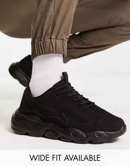 sneakers in black with chunky sole