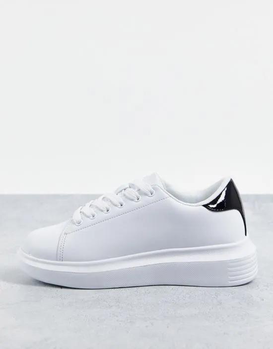 sneakers in white with black tab