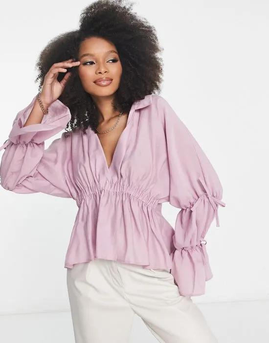 soft blouse with volume tie sleeve in mauve