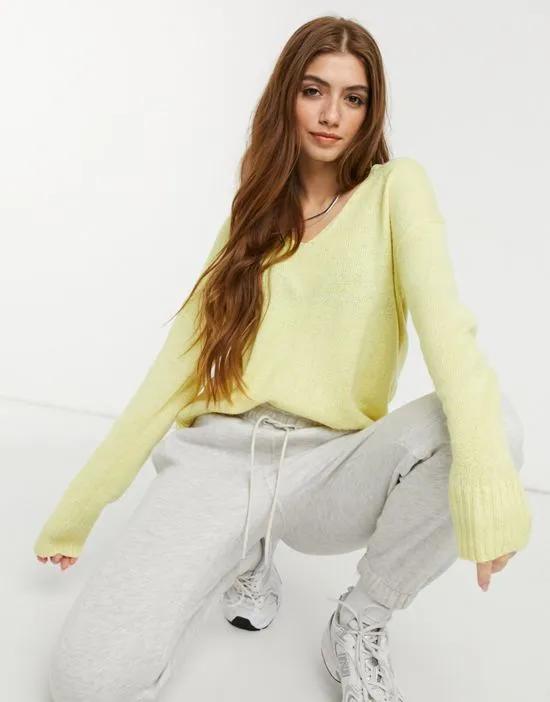 soft ribbed v neck sweater in pale yellow