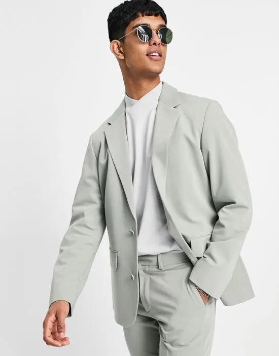 soft tailored oversized suit jacket in olive herringbone