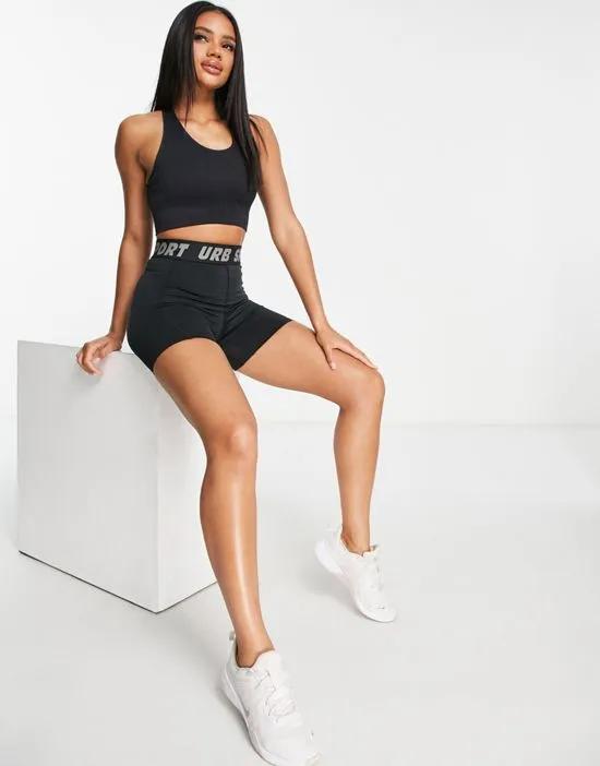 sports booty shorts with ruching in black