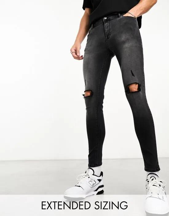 spray on jeans with power stretch denim with knee rips in washed black