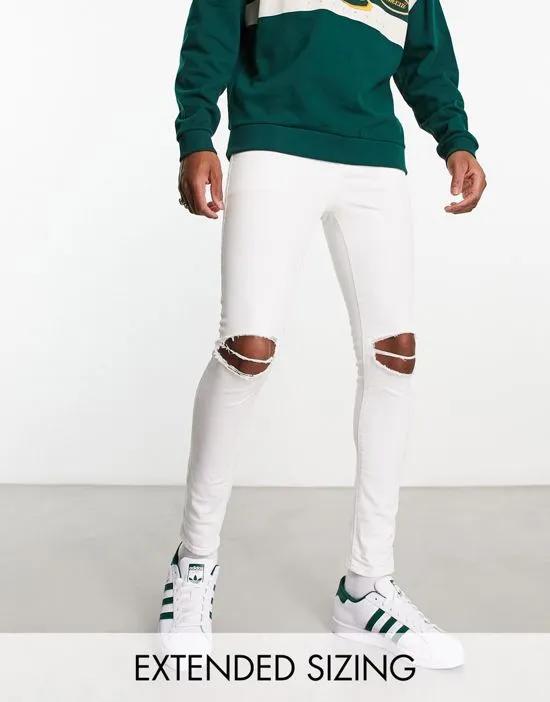 spray on jeans with power stretch in white with rips