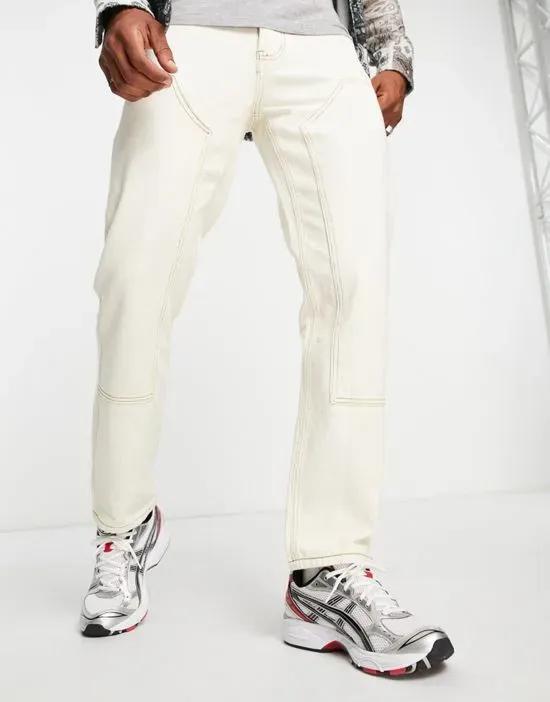 straight leg denim jeans in off white with carpenter panels