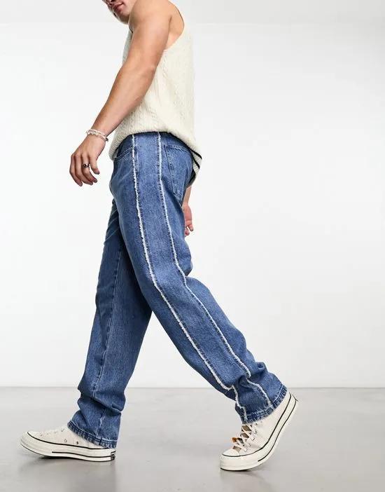 straight leg jeans with fraying side seams