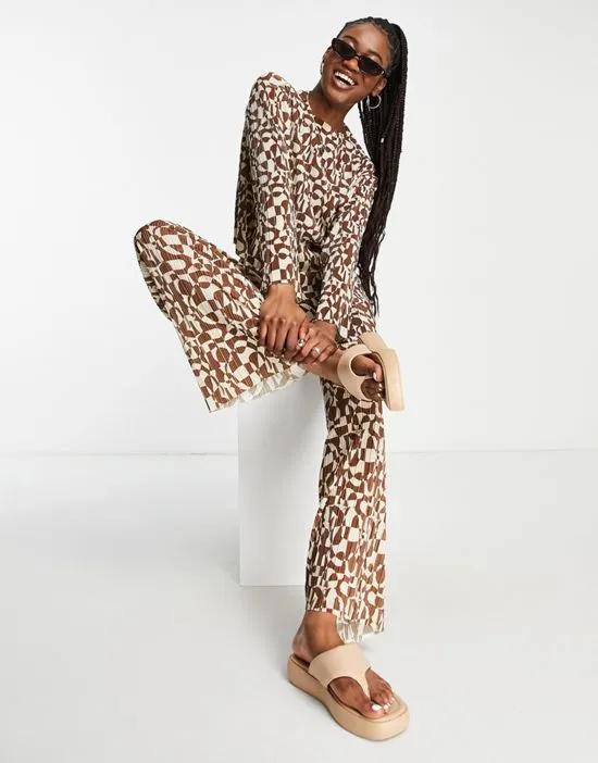 straight leg plisse pants in brown retro circle print - part of a set