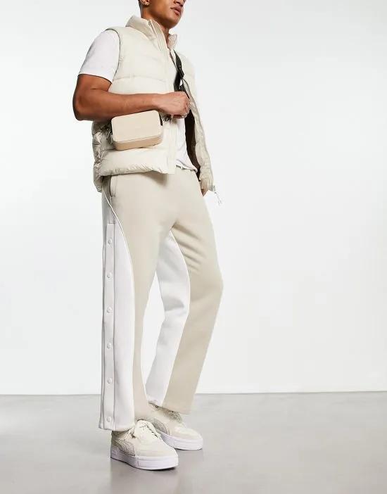 straight leg sweatpants in beige with snaps