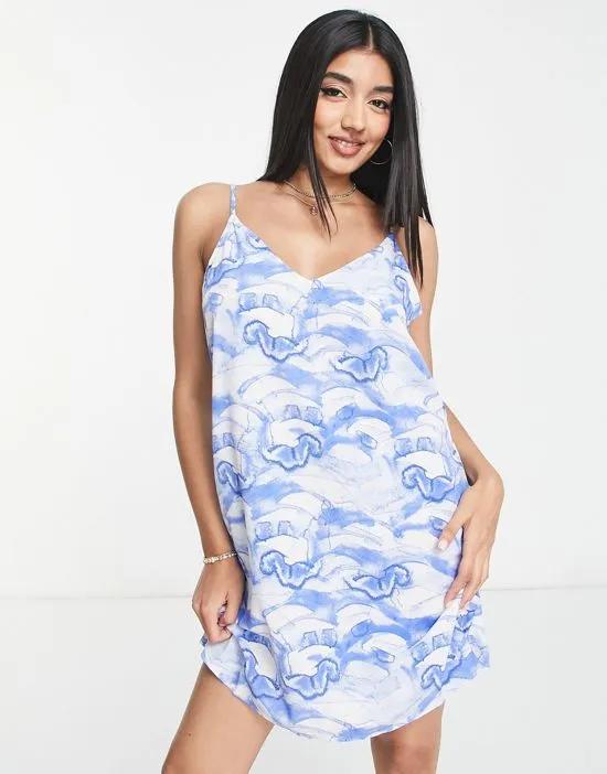 strappy mini dress in blue wave print