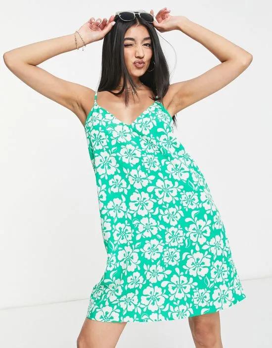 strappy mini dress in green hibiscus floral print
