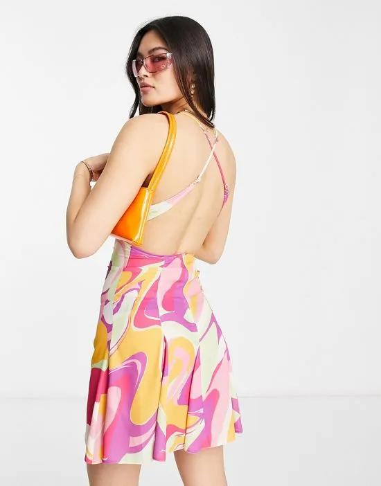 strappy mini dress with flare skirt in bright swirl