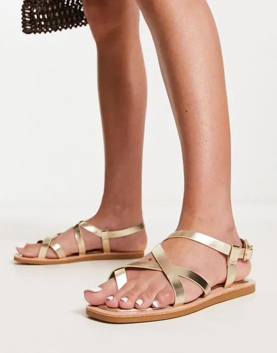 strappy sandals with padded sole in gold