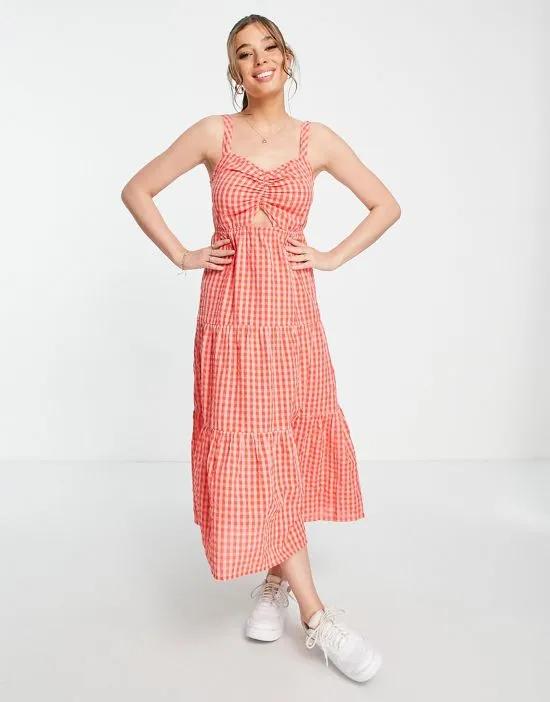 strappy tiered midi dress with cut out in red and pink gingham