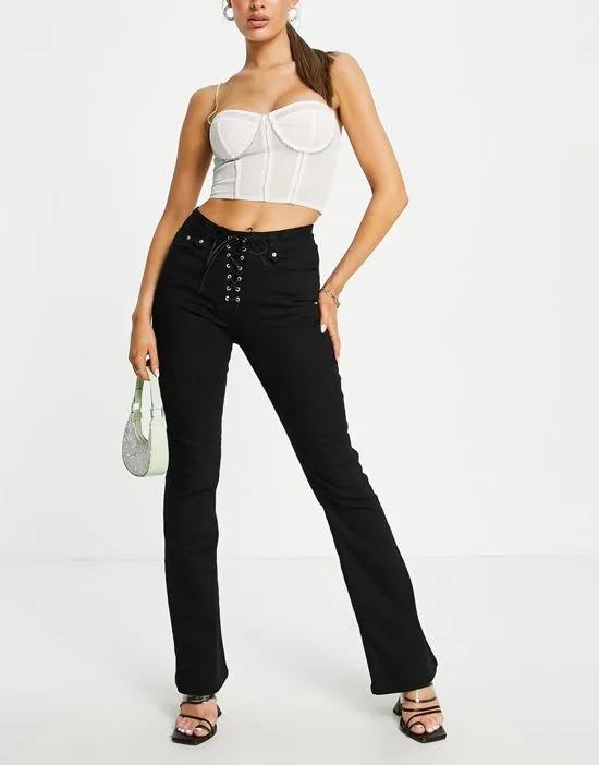 stretch flare jeans with lace-up in black