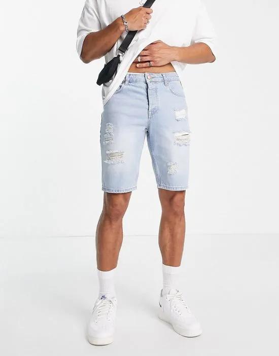 stretch slim denim shorts with rips in light wash blue