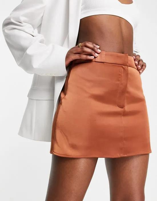 structured belt loop mini skirt in bronze