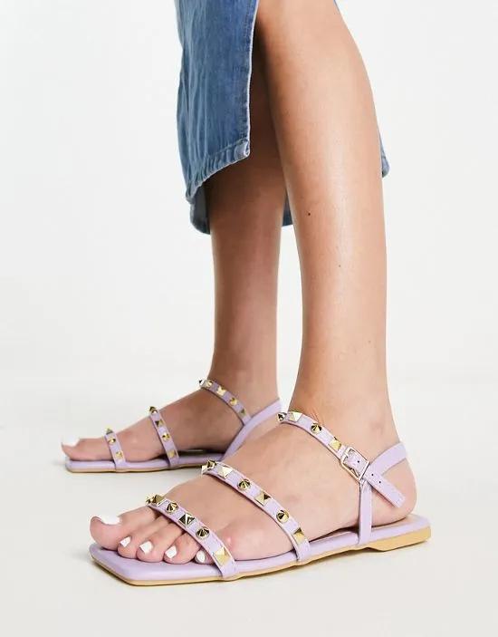 studded strappy flat sandals in lilac