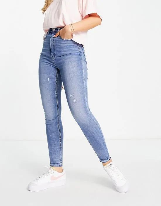 super high waist skinny jeans in medium blue