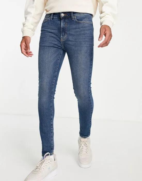 super skinny jeans in mid blue