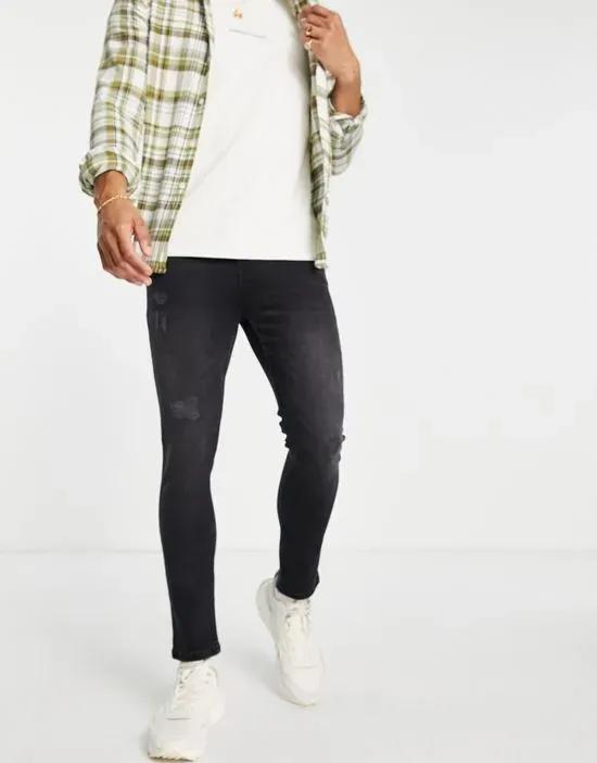 super skinny jeans with rips in washed black