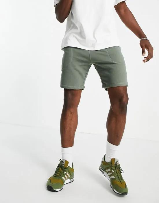 sweat shorts in washed green - part of a set