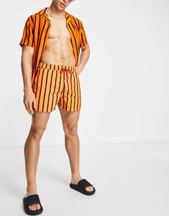 swim short in orange stripe