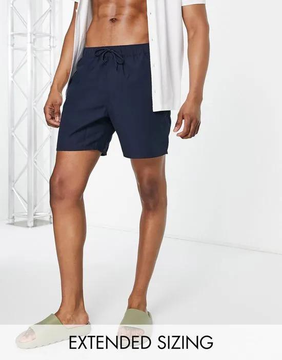 swim shorts in mid length in navy