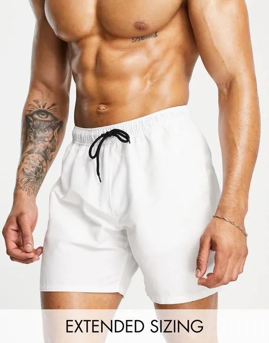 swim shorts in mid length in white