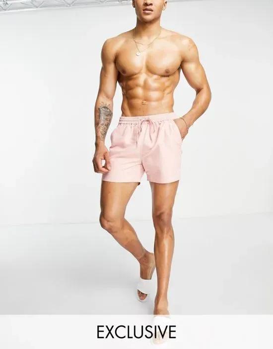 swim shorts in pink