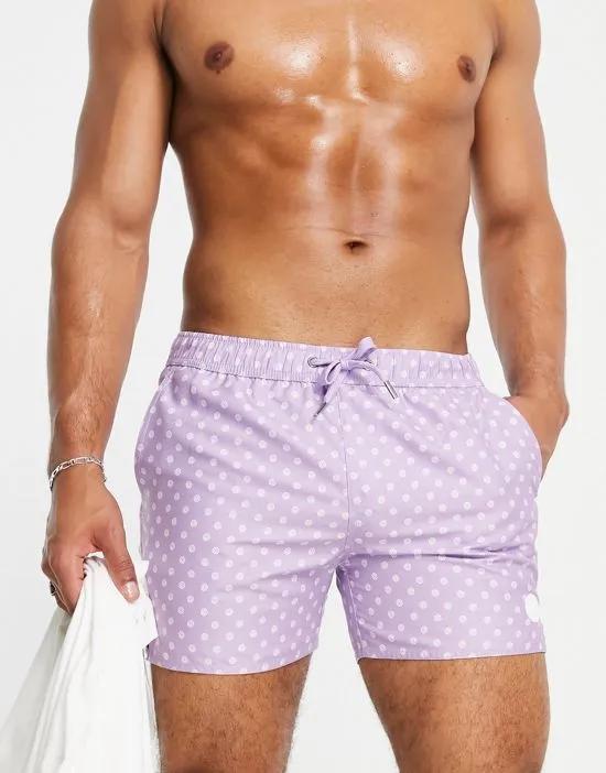 swim shorts in purple paisley polka dot