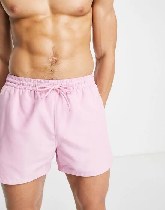 swim shorts in short length with curved hem in pink