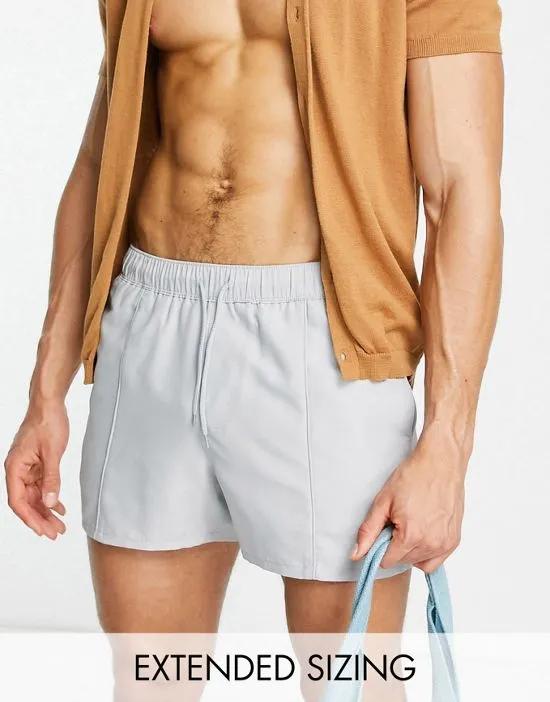 swim shorts in short length with pin tuck in light gray