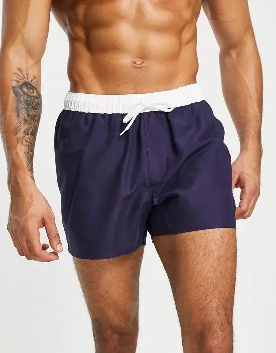 swim shorts in short length with white tipping in navy