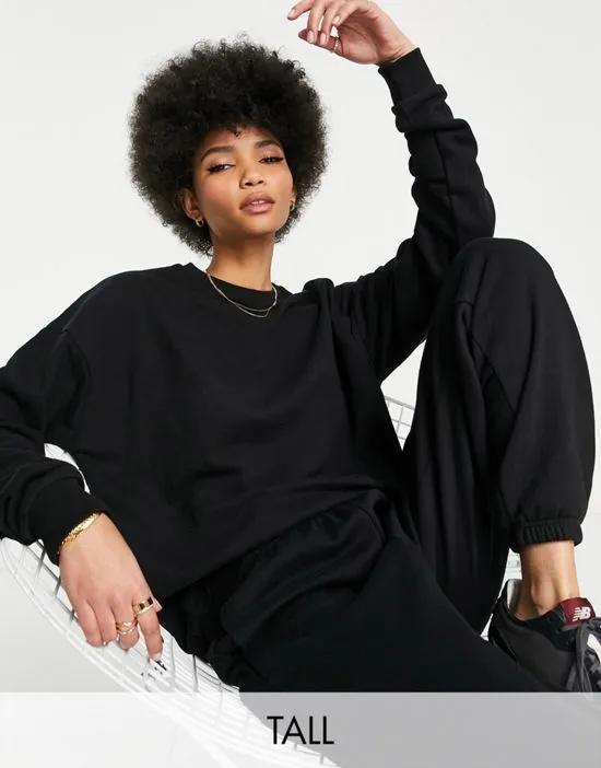 Tall oversized high neck sweatshirt with woven logo tab in black