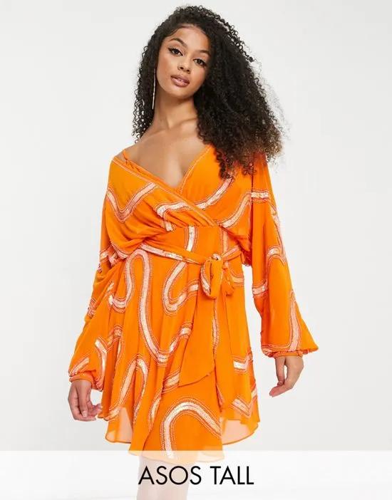 Tall Rouleaux loop tie waist mini dress with swirl embellishment in orange