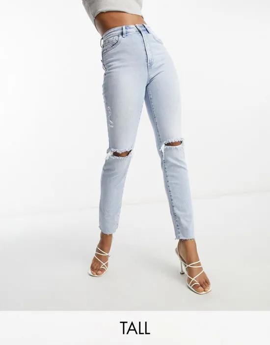 Tall slim mom jean with stretch and rips in vintage blue