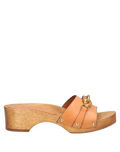 Tan Mules and clogs