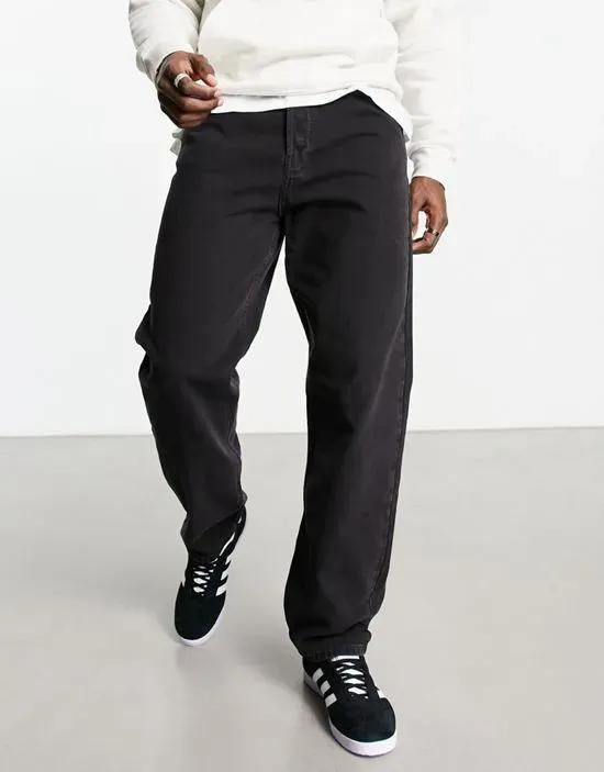tape loose tapered jeans in black lux