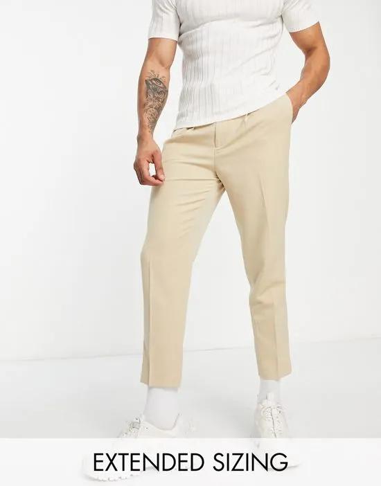 tapered pants in stone