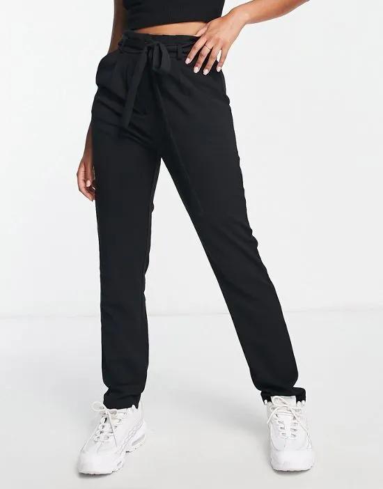 tapered pants with paper bag waist in black - part of a set