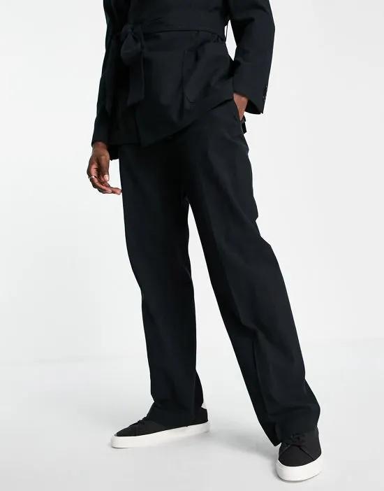 tapered suit pants in black crepe