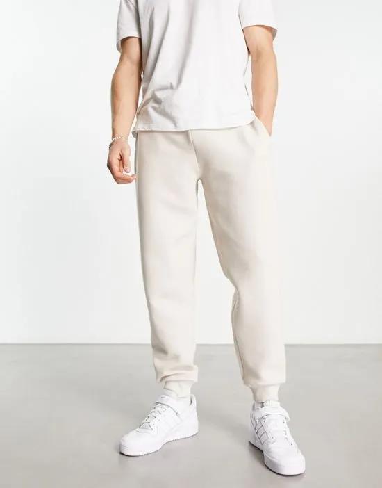 tapered sweatpants in beige jacquard - part of a set