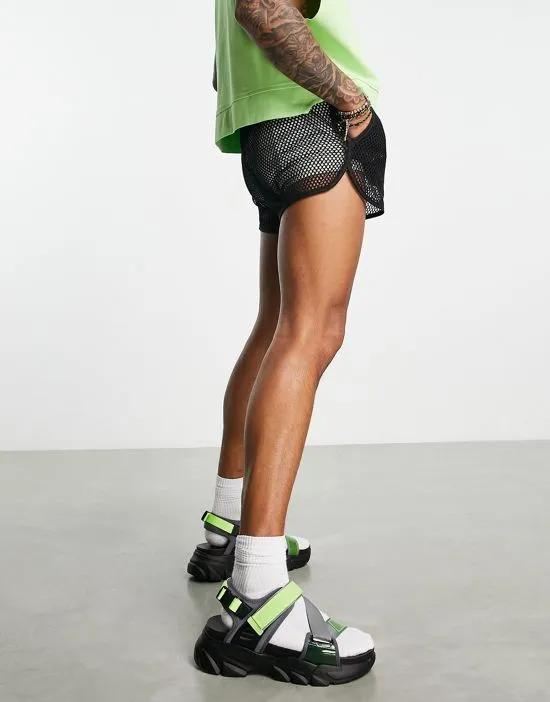 tech sandals in black and neon green on chunky sole