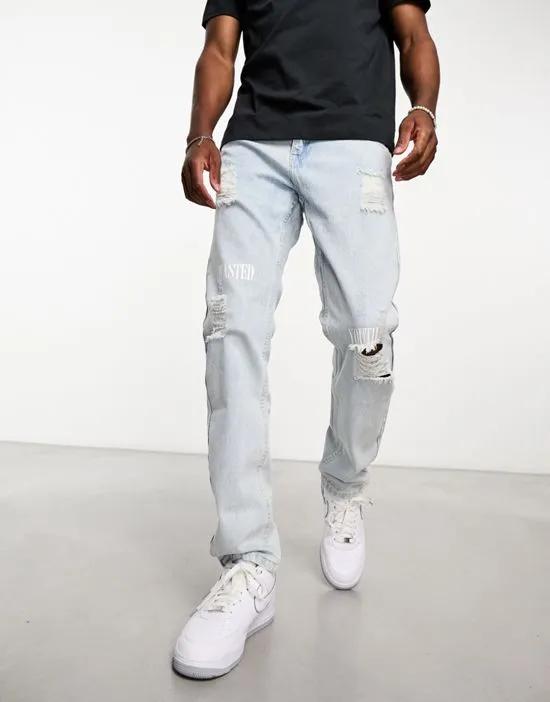 Teddy slim tapered jeans with rips in light blue